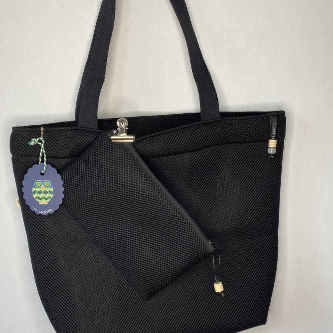 designer maxi bag with matching toiletry bag, black