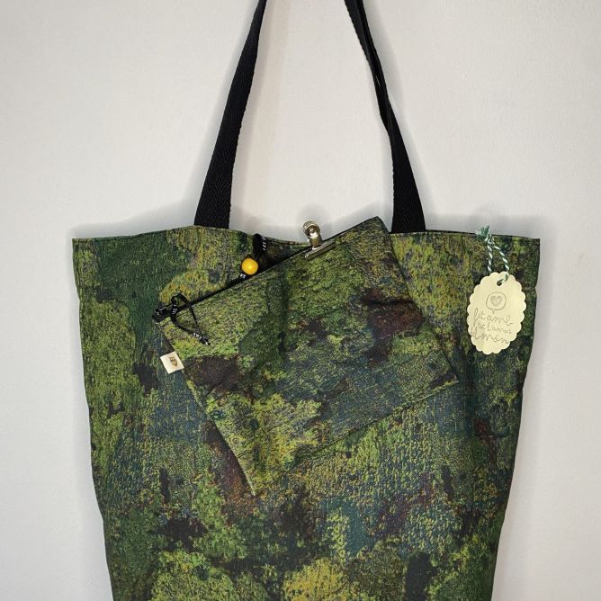 Designer maxi bag with matching toiletry bag, green