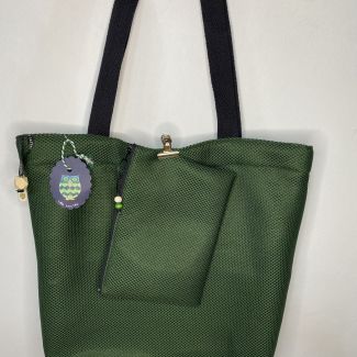 Designer maxi bag with matching toiletry bag, green