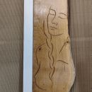 Relieve en madera Momentos