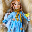 Angel with bird in hand