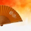Amber silk folding fan: luxurious hand-painted fan with rhinestones 2
